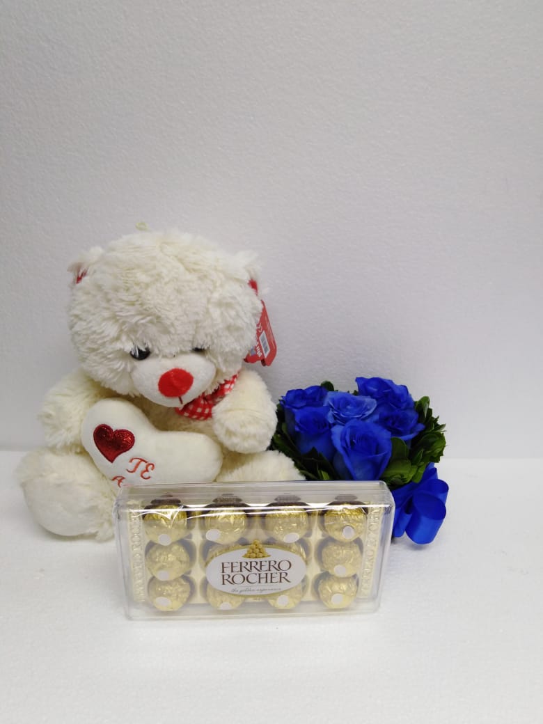 6 Rosas Azules en Caja Corazn, Bombones Ferrero Rocher 150Grs y Peluche con corazn de 30cm